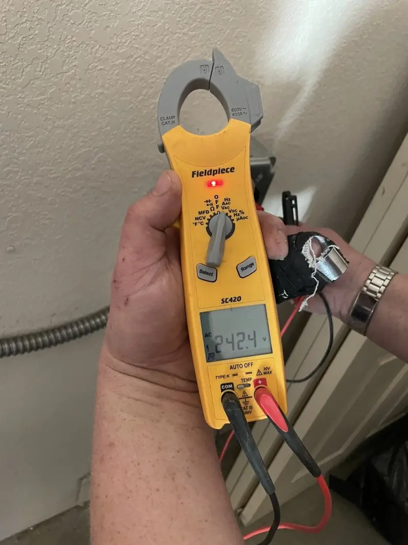 Voltage testing with clamp meter during Whole House Surge Protector in Cary